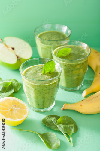 healthy green smoothie with spinach leaves apple lemon banana