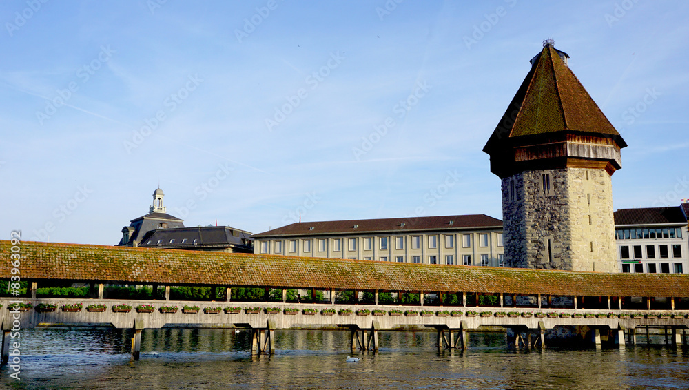 historical wooden Chapel Bridge and tower in Lucerne