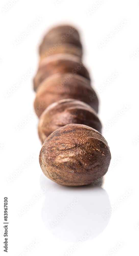 Nutmeg over white background Nutmeg over white background