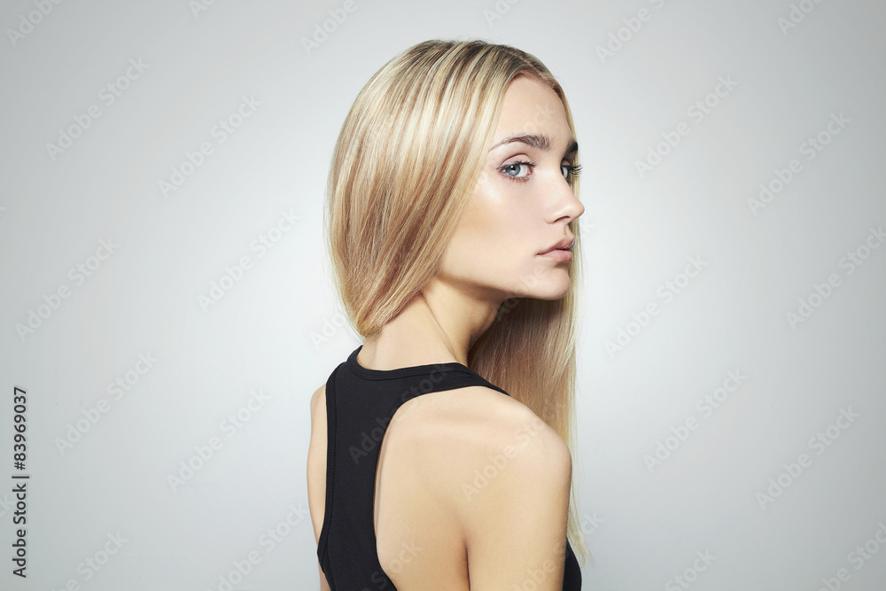 Young blond woman with blue eyes.Beautiful blonde Girl Young blond woman with blue eyes.Beautiful blonde Girl