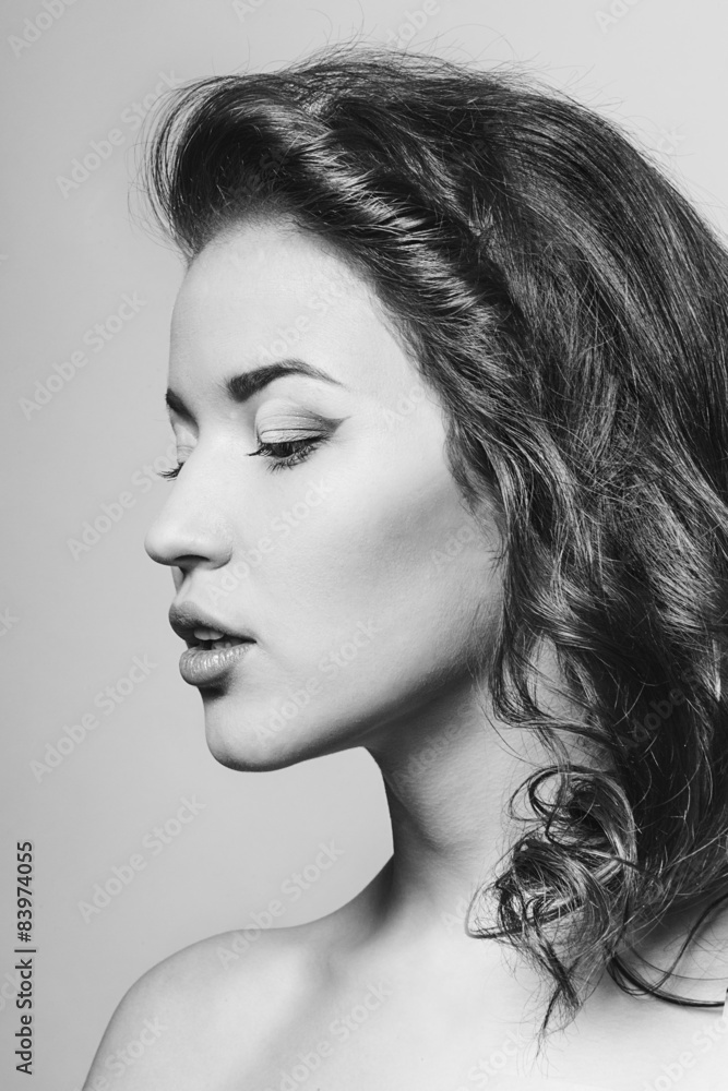 Beauty portrait of a girl with a flower in her hair. Beauty portrait of a girl with a flower in her hair.
