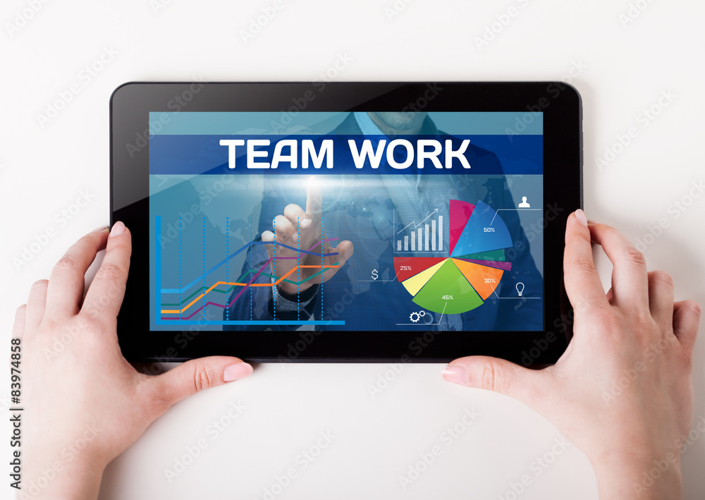 Girl holding a tablet pc which a man presses the virtual screen Girl holding a tablet pc which a man presses the virtual screen