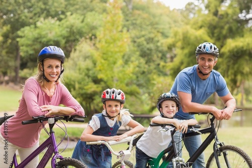 Happy family on their bike at the park 