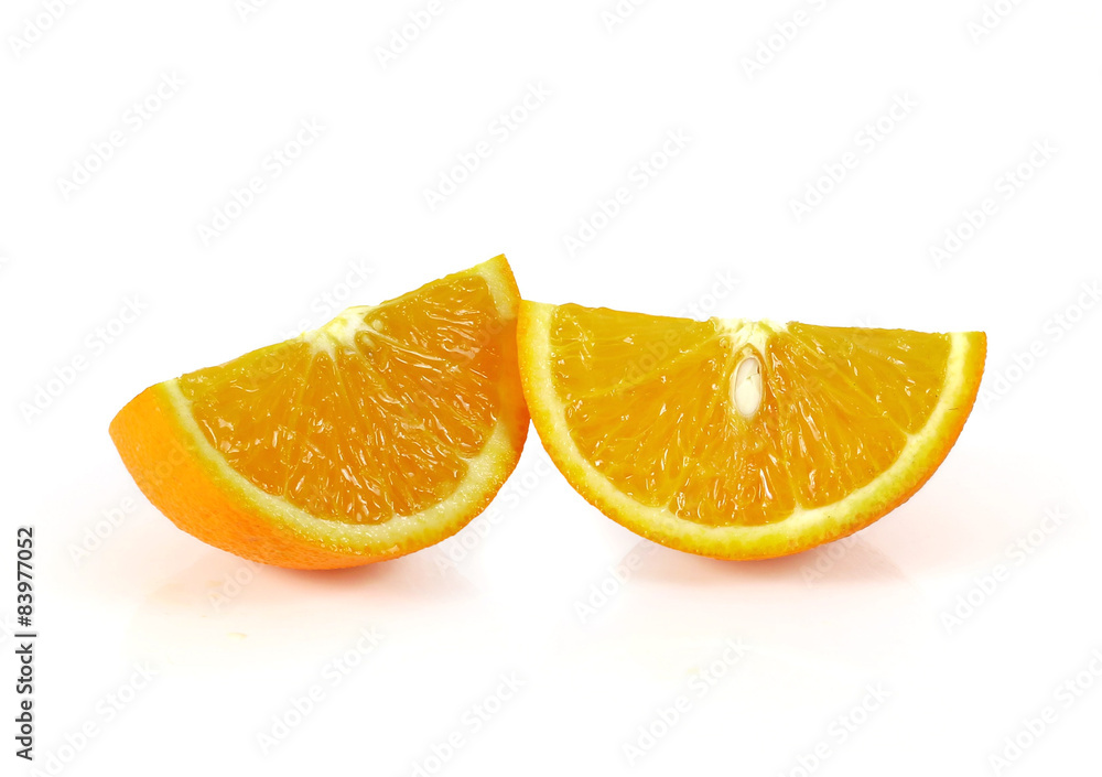 Two orange fruit segments or cantles isolated on white backgroun Two orange fruit segments or cantles isolated on white backgroun