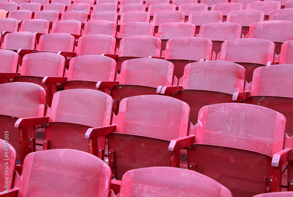 Naklejka premium red chairs in the stadium before the show