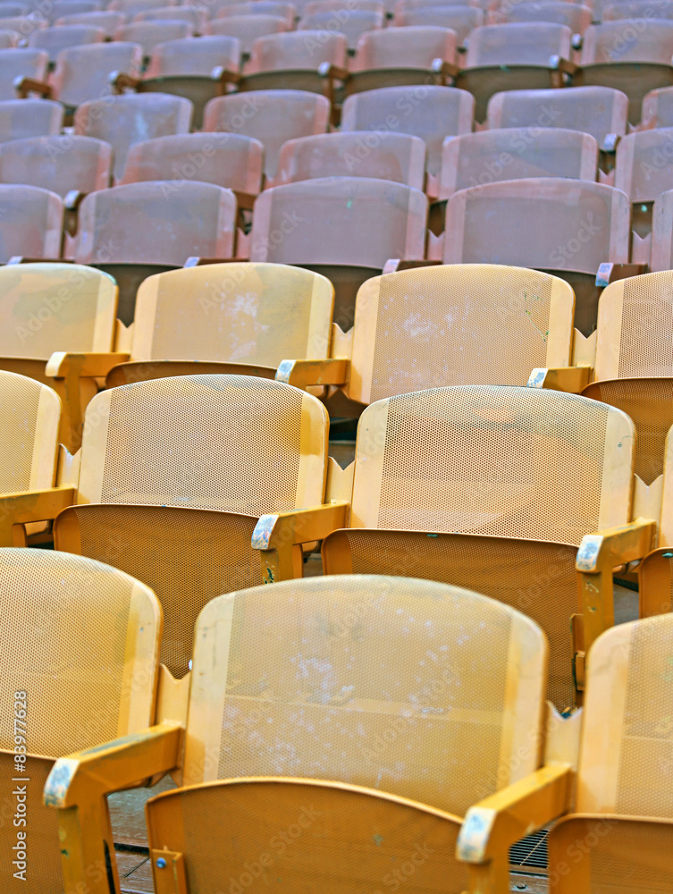 Naklejka premium empty seats in the stands before the sporting event