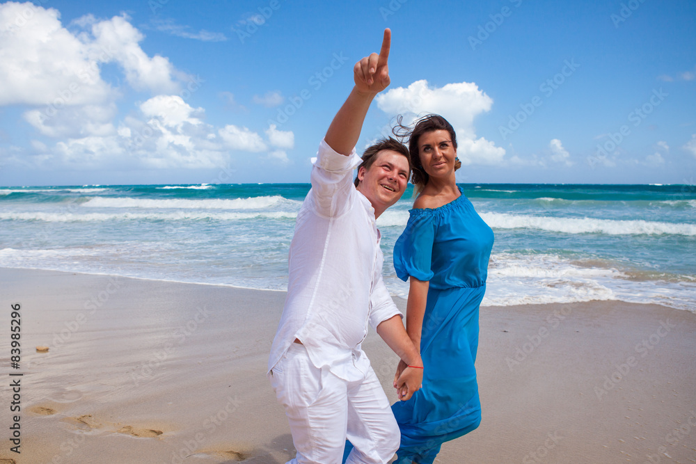 Beach couple walking on romantic travel. Beach couple walking on romantic travel.