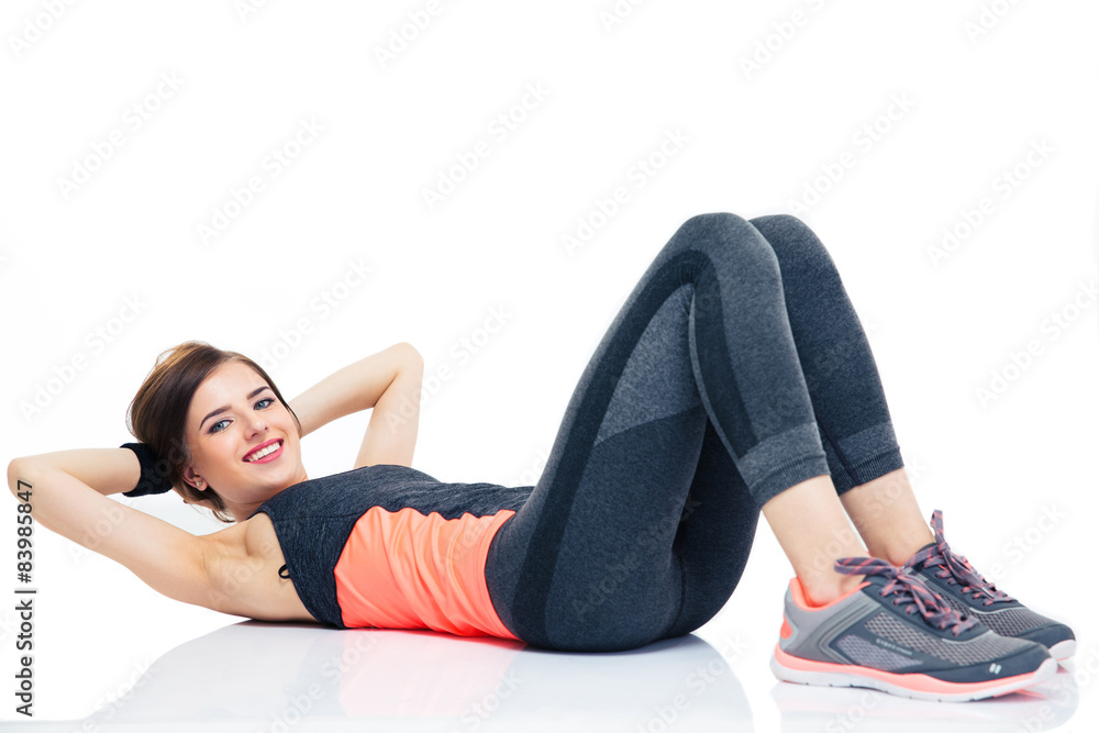 Fitness woman working out on the floor Fitness woman working out on the floor