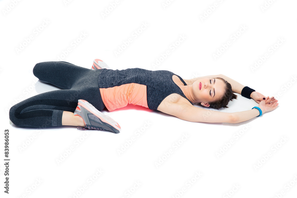 Sporty woman stretching isolated on a white background