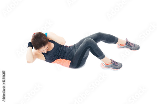 Woman doing exercises for abdominal muscles