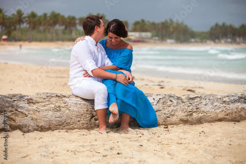 Beach couple walking on romantic travel.