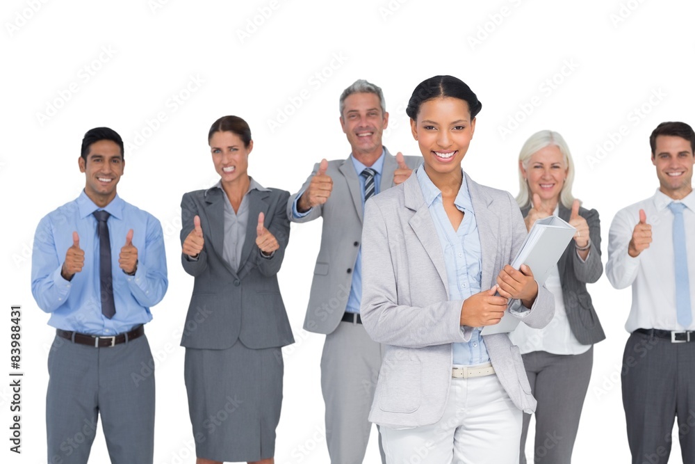 Happy business people looking at camera with thumbs up Happy business people looking at camera with thumbs up