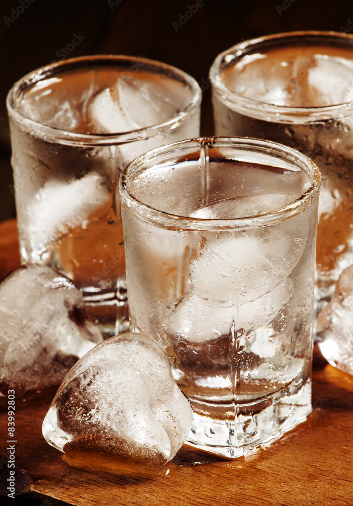 Сold fresh water with ice in a heart shape in the misted glasse Сold fresh water with ice in a heart shape in the misted glasse