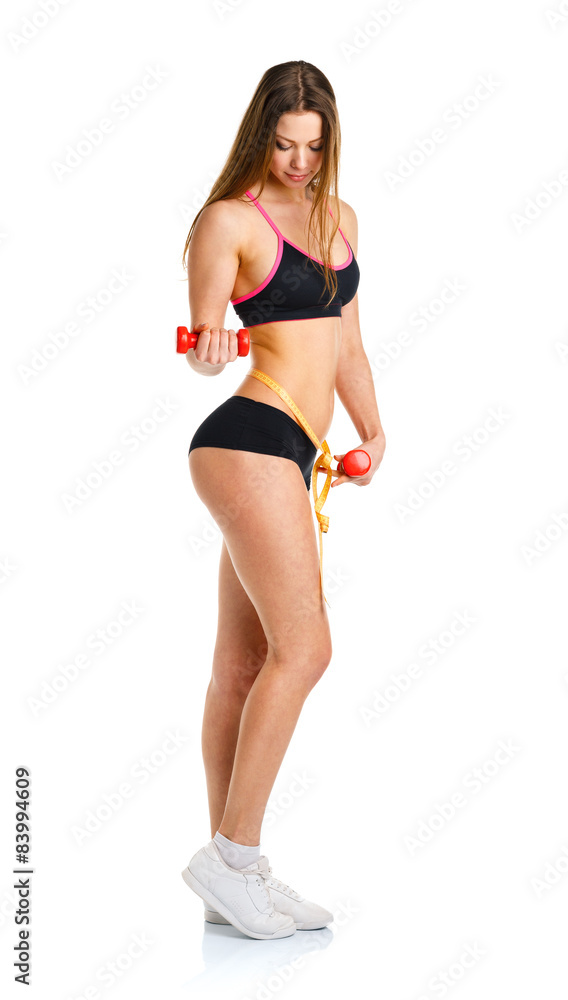 Beautiful sport woman with dumbbells doing sport exercise, isola Beautiful sport woman with dumbbells doing sport exercise, isola