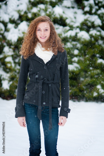 Tableau sur toile Teenage girl outdoors on a winter day