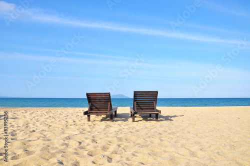 Beach chairs on sand beach. with copy space area