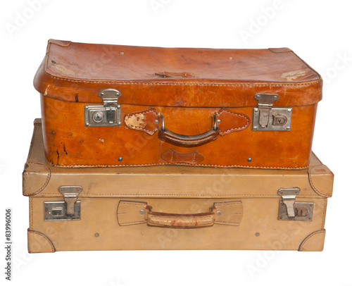 Two vintage suitcases, white background
