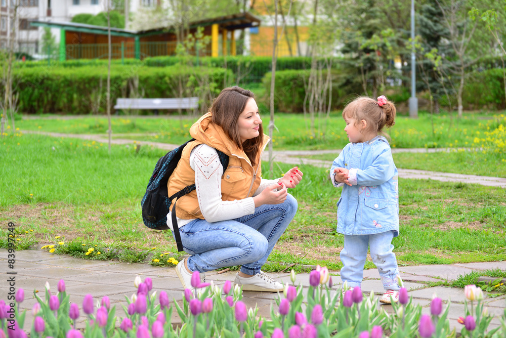 Mom and daughter 2.5 years for walk Mom and daughter 2.5 years for walk