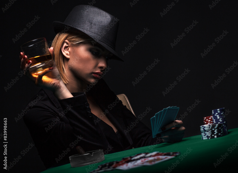 Beautiful young woman playing poker Beautiful young woman playing poker