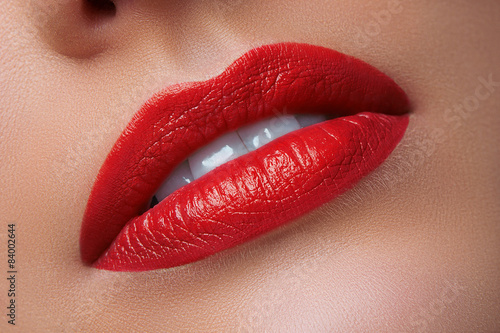 Close-up of Woman's Lips with Bright Fashion Red Lips