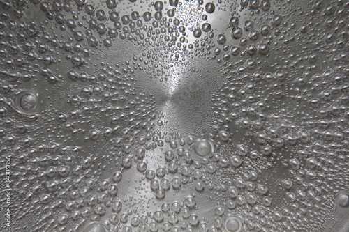 Photos background: close-up bubbles of boiling water