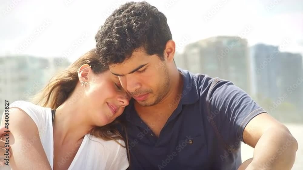 Brazilian couple embrace on a beach in Brazil Brazilian couple embrace on a beach in Brazil