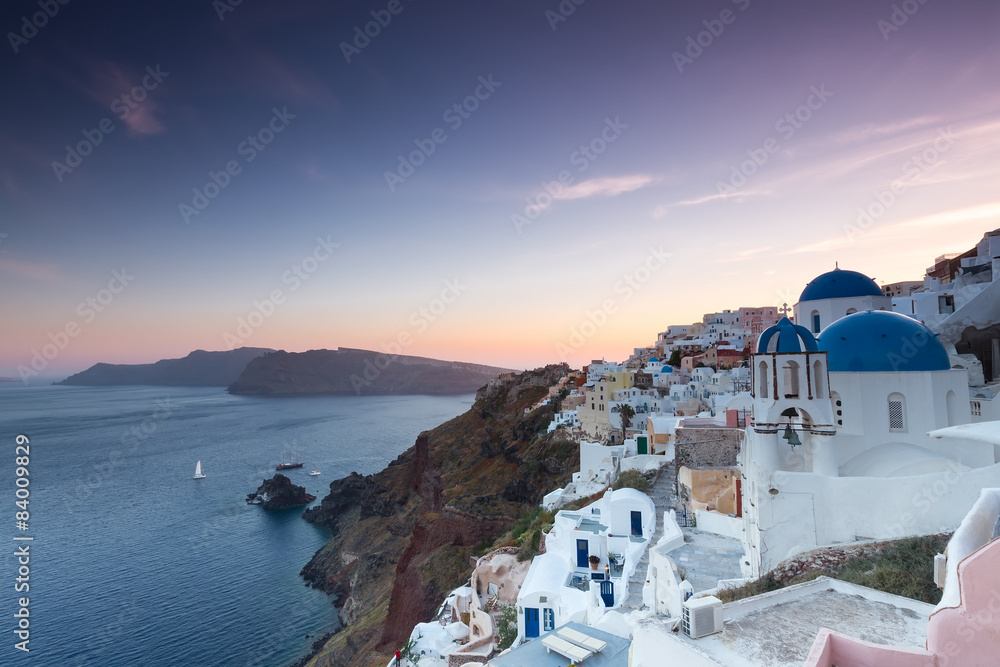 The sunset at Oia village in Santorini island in Greece