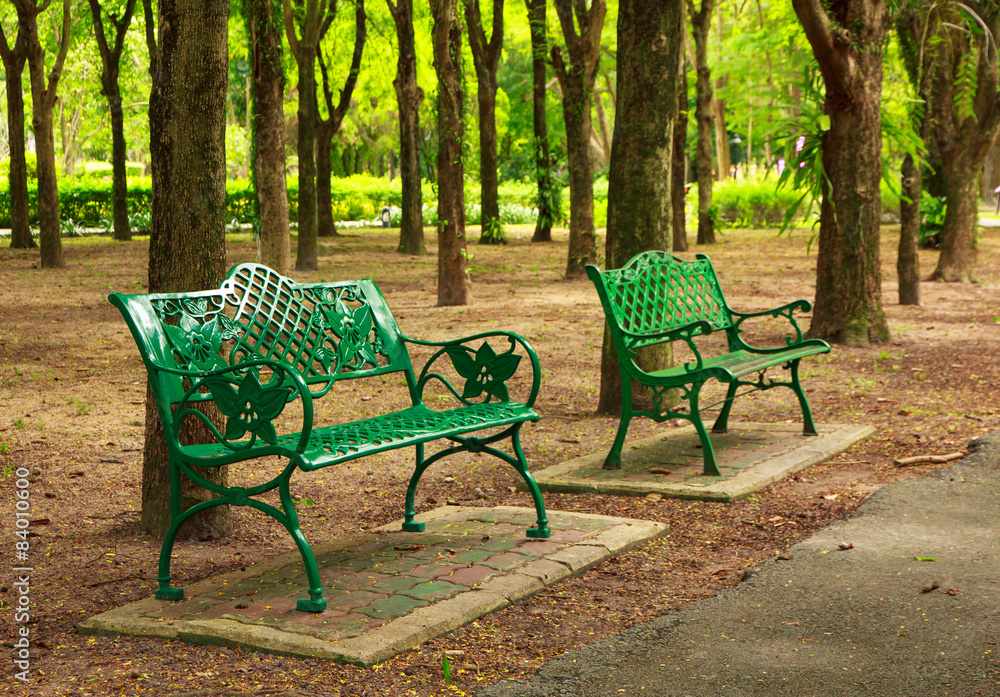 Stock Photo - green chairs in the garden