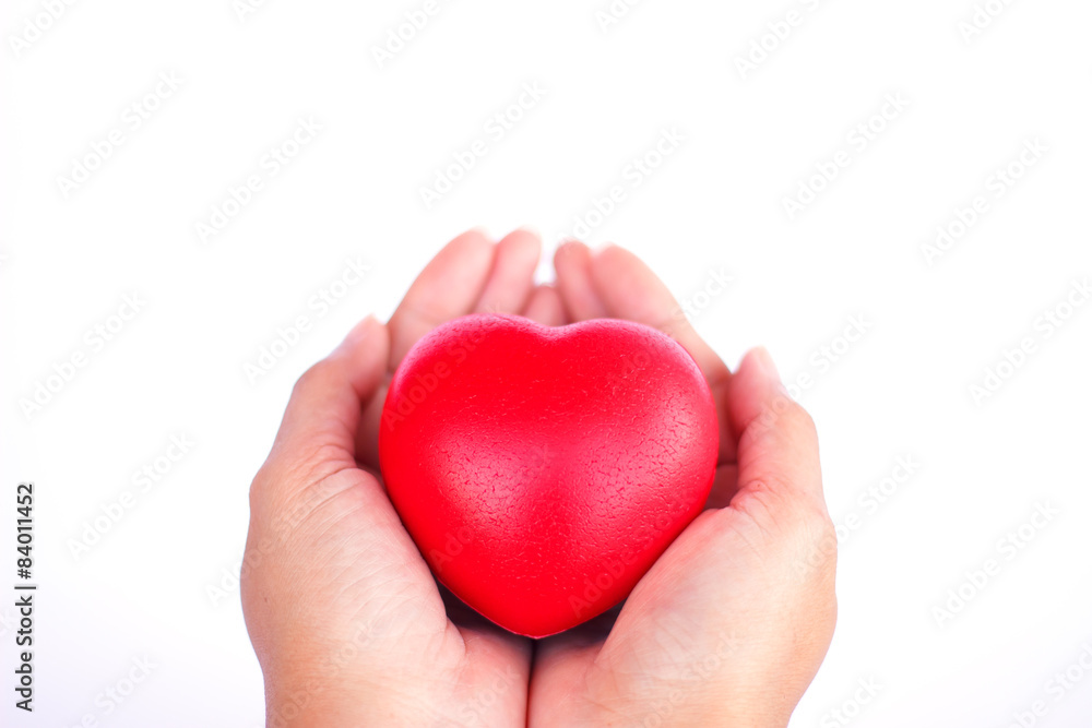 Stock Photo - Red heart in woman hand Stock Photo - Red heart in woman hand