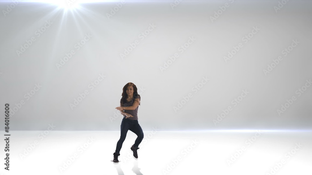 An attractive young girl shows off her dancing skills An attractive young girl shows off her dancing skills