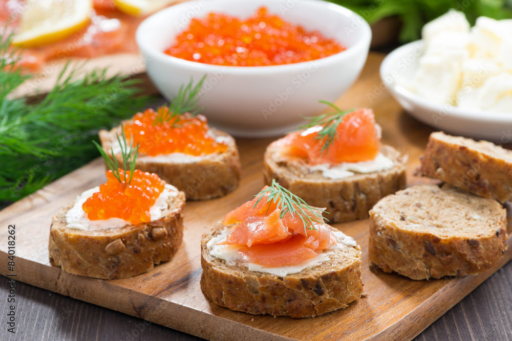 appetizers - toast with salted salmon and red caviar
