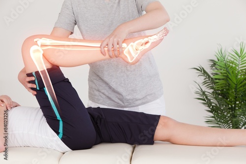 Highlighted bones of woman at physiotherapist  photo