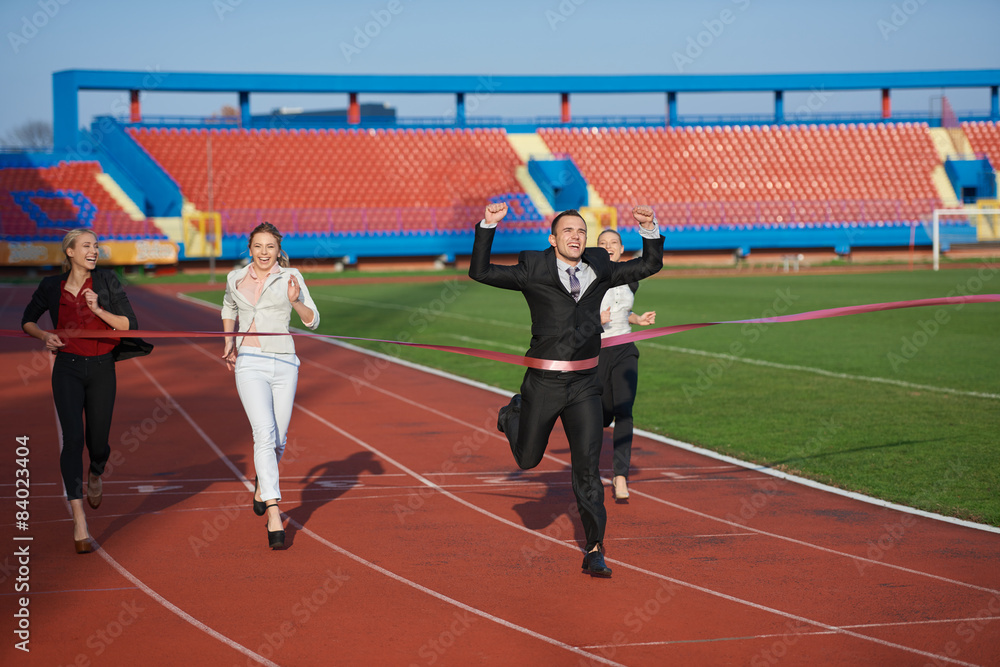 business people running on racing track