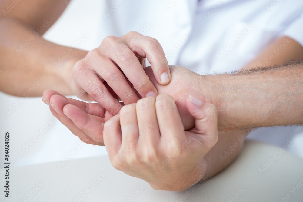 Doctor doing hand massage Doctor doing hand massage