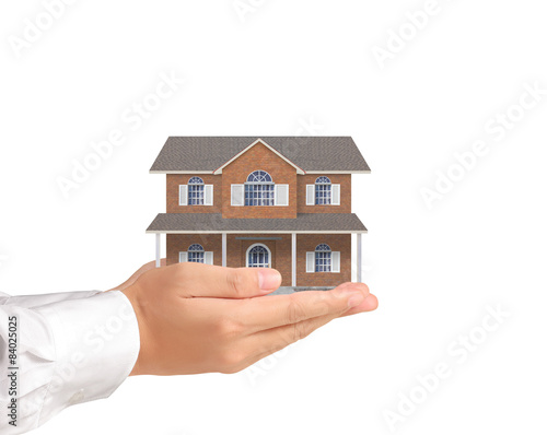holding house representing home ownership