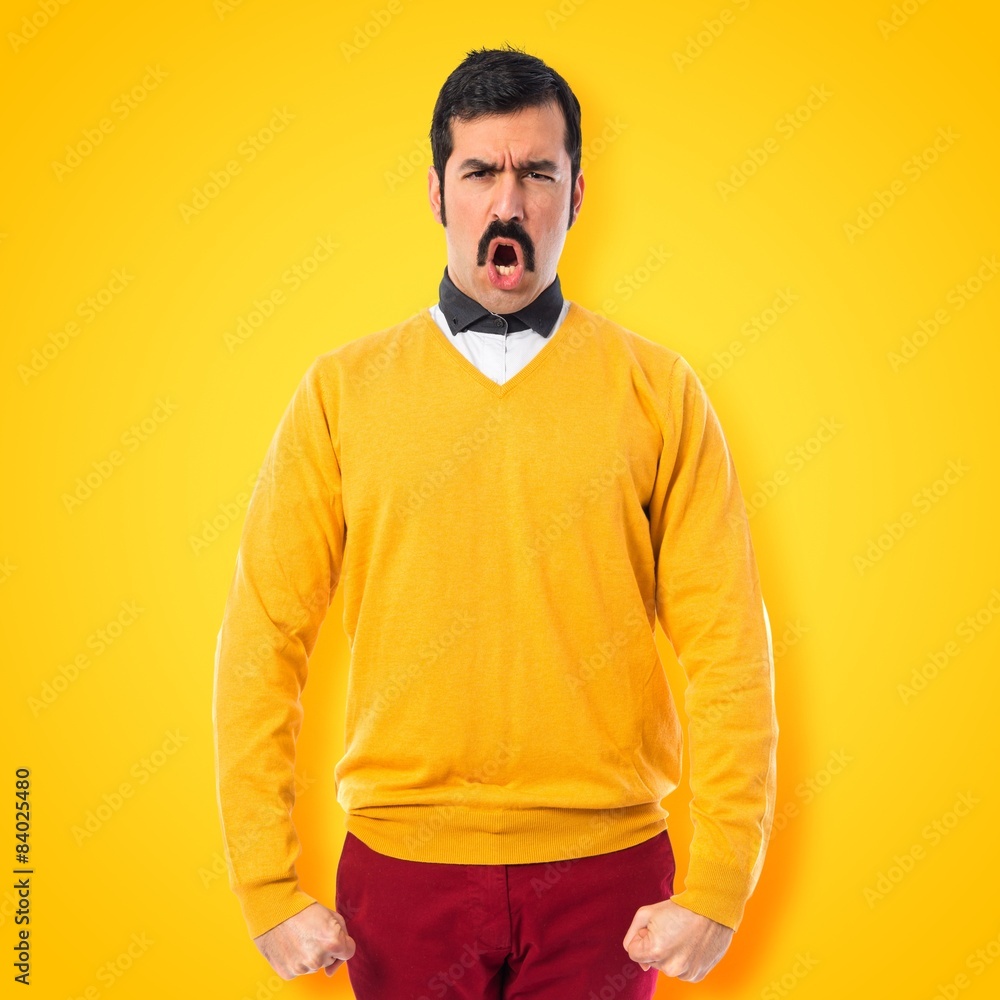 Twin brothers with moustache shouting Twin brothers with moustache shouting