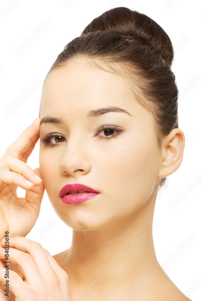 Woman with full make up touching face. Woman with full make up touching face.