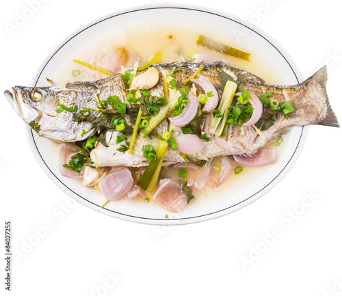 Malaysian dish of sweet and sour steamed Asian bass fish