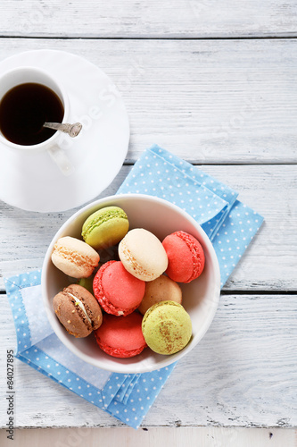 Macaroon with coffee on the boards