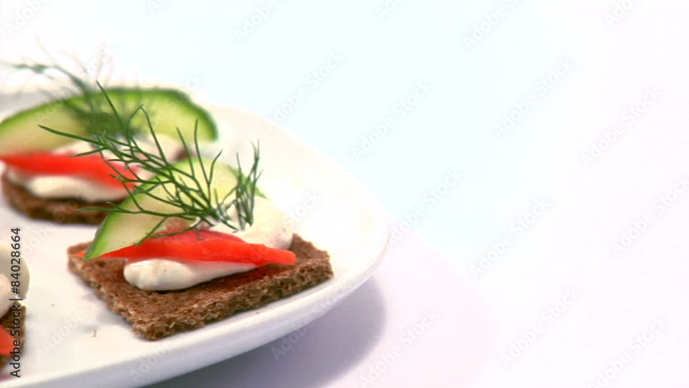 Delicious looking finger sandwiches on a white background Delicious looking finger sandwiches on a white background
