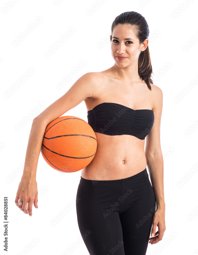 Woman playing baktetball
