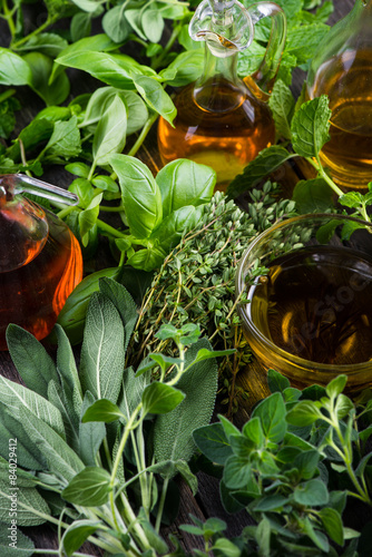 Fresh herbs from garden with olive oil