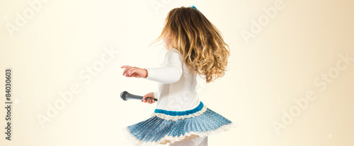 Little blonde girl dancing