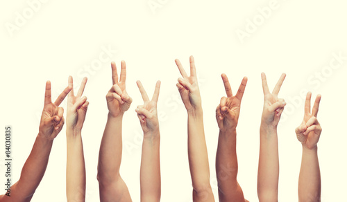 human hands showing v-sign