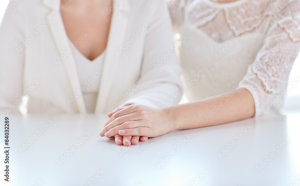 close up of happy married lesbian couple hands close up of happy married lesbian couple hands