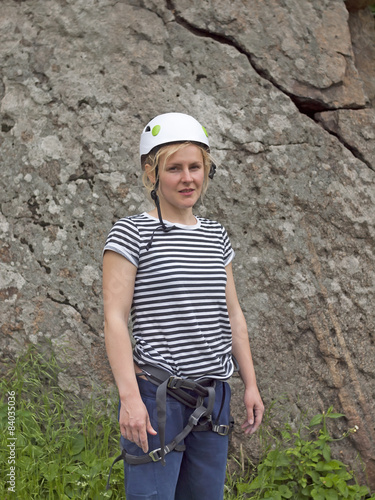 The girl in a helmet for safety.