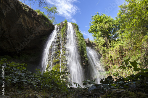 Fototapeta Naklejka Na Ścianę i Meble -  High-Water Waterfall in the Spring