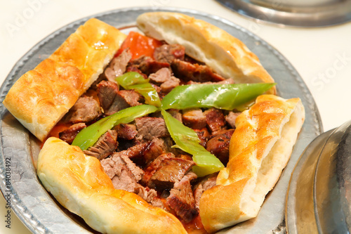 Turkish Kebab served in an anatolian plate.