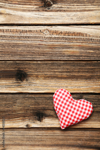 Love hearts on brown wooden background