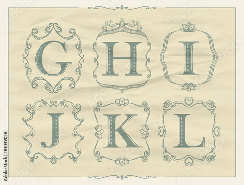 Vintage calligraphic letters in monogram retro frames